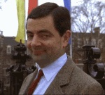 Rowan Atkinson as Mr. Bean with his classic eyebrows (static)